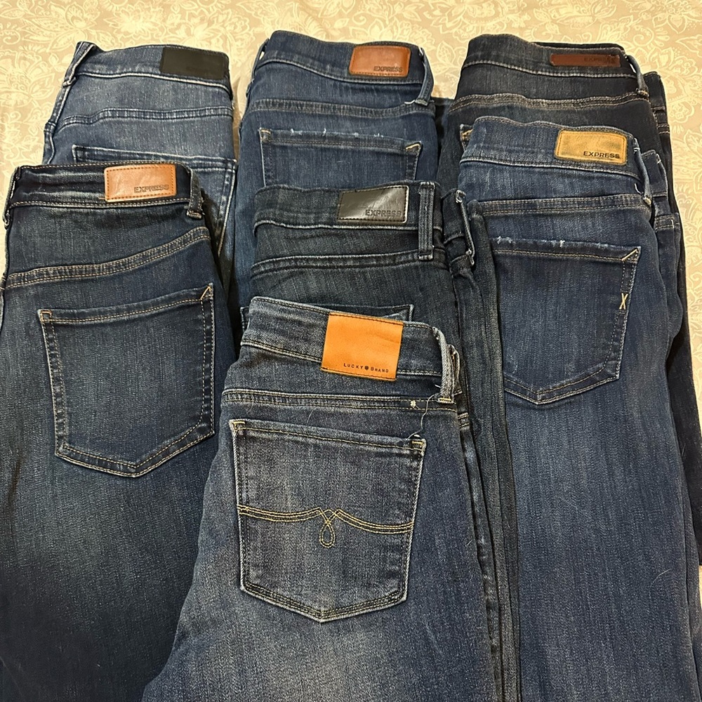 #7 pairs Express Jeans, one pair is Lucky Brand(size 2).  Sizes are 00,0 and 2